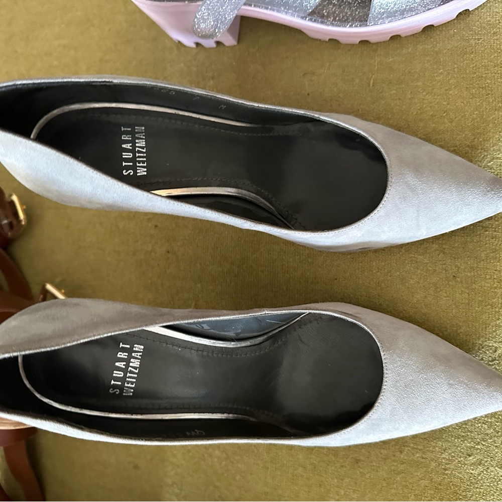 Sexy as hell Stuart Weitzman baby grey leather heels.
